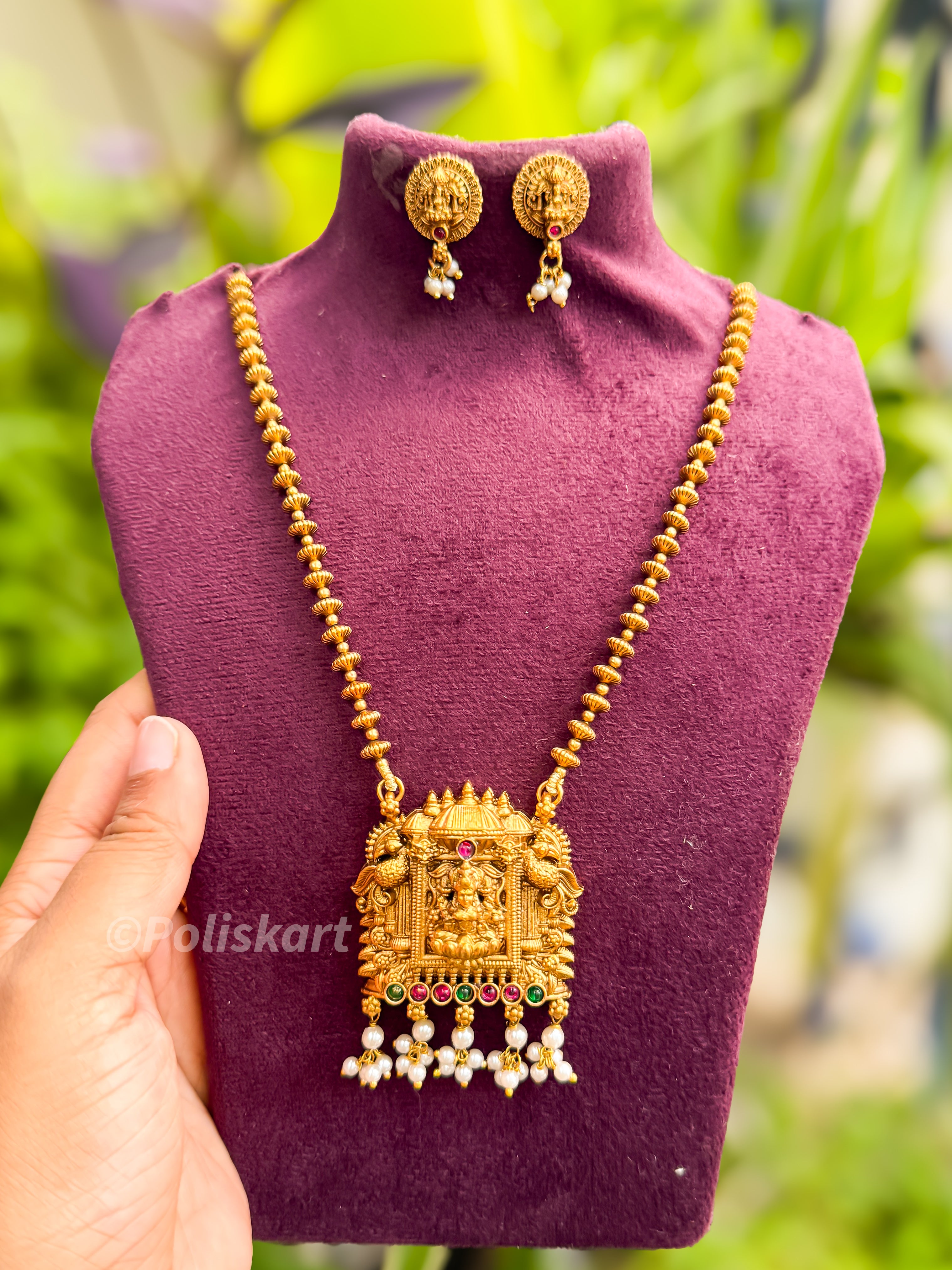 White pearl worked lakshmi pendant with chain and earing
