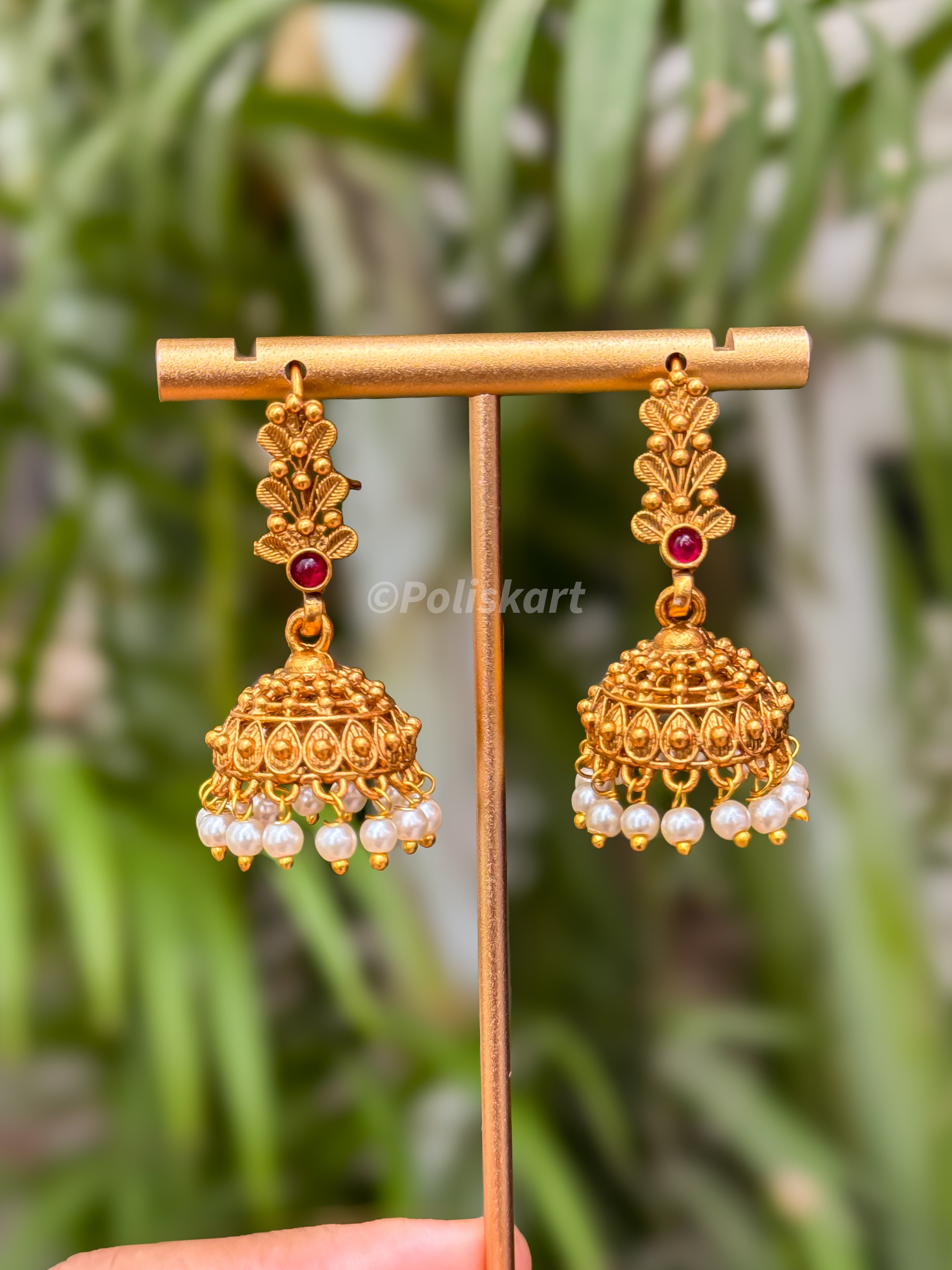 White stone worked jhumka